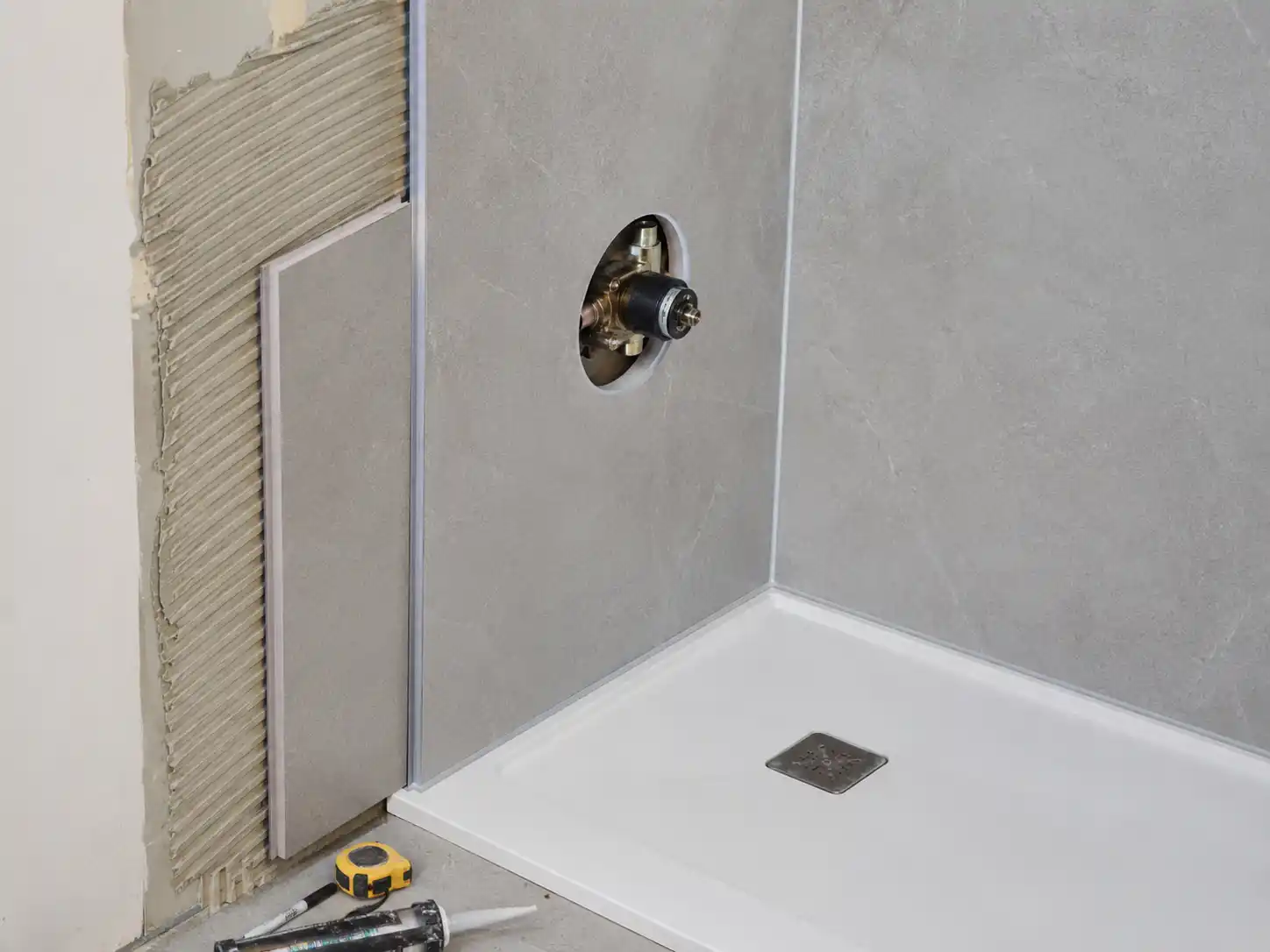 Bathroom wall panel joints sealant and plumbing penetrations