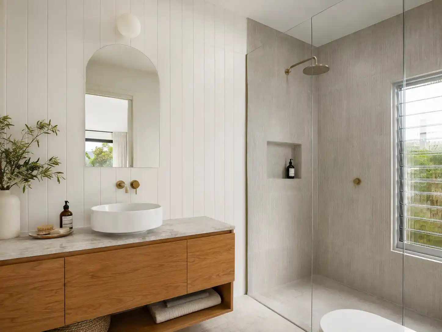 VJ panelling on a bathroom wall outside the shower